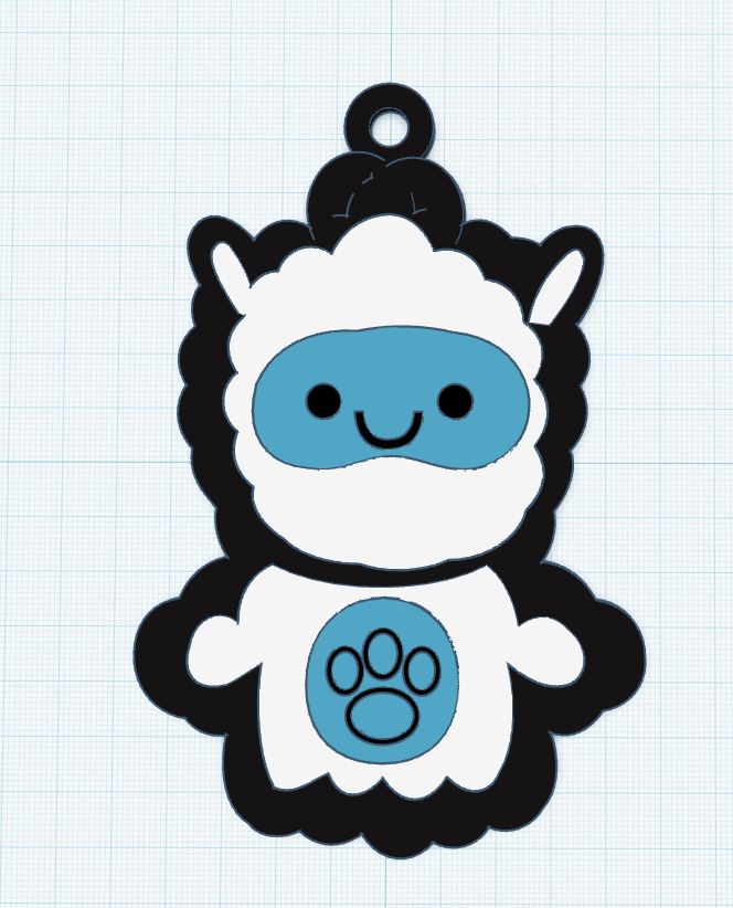 Yeti Baby character key chain design with a blue face, white fur, and smiling expression